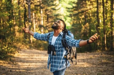 Person enjoying a peaceful moment outdoors